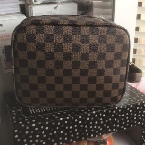 Cosmetic pouch by DAISY ROSE